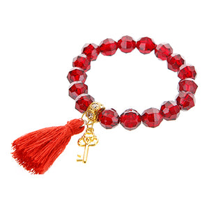 Pulsera Con Borla Roja Y Dije Llave