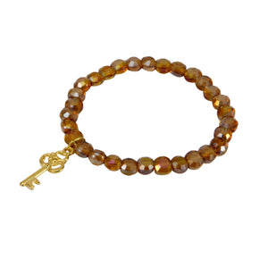 Pulsera Con Cristal Pastilla Con Dije Llave